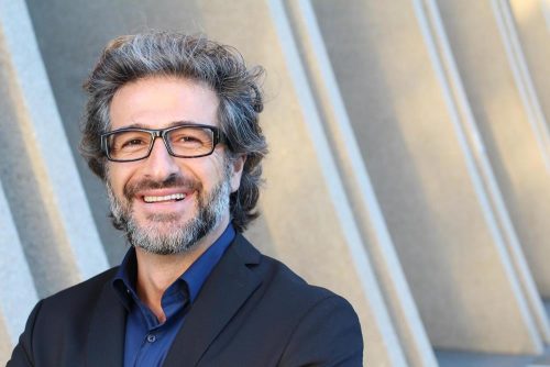 man in jacket smiling